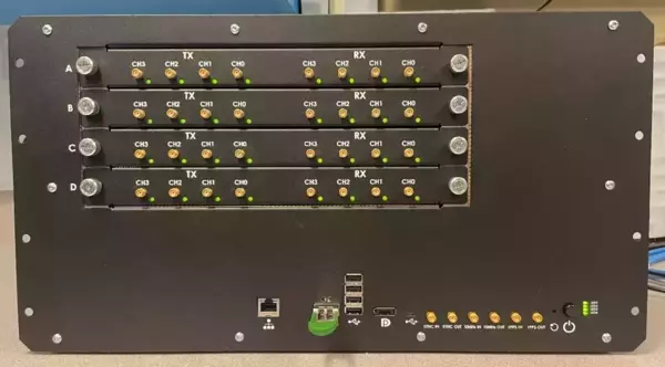 Dark gray multi-channel electronic rack. Four modules (A-D) display 8 gold TX/RX connectors each with active green LEDs. Additional ports are aligned to the bottom of the panel.