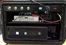 A black case housing a single radar node with Ettus N310 software defined radio